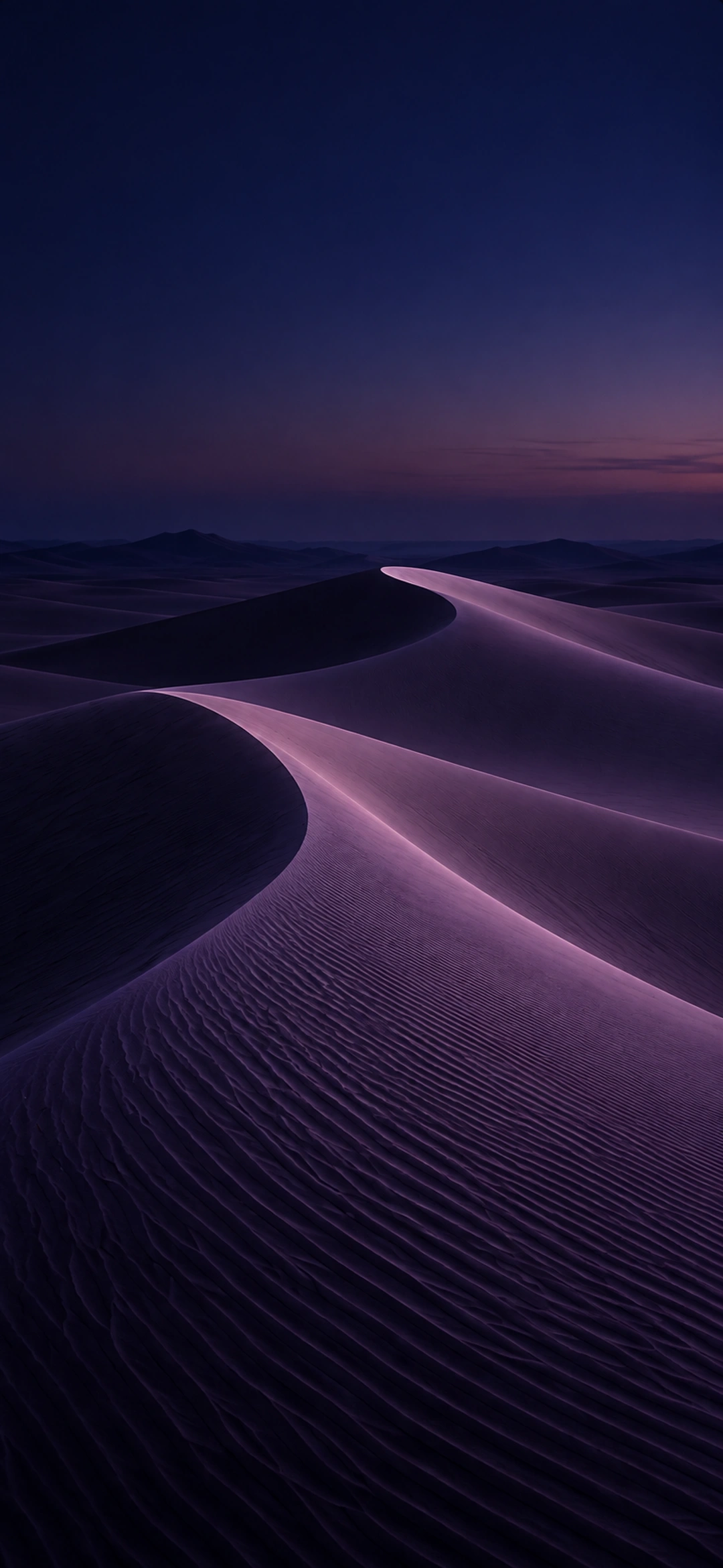 Soft violet sand ridges beneath a calm open horizon, dark phone composition