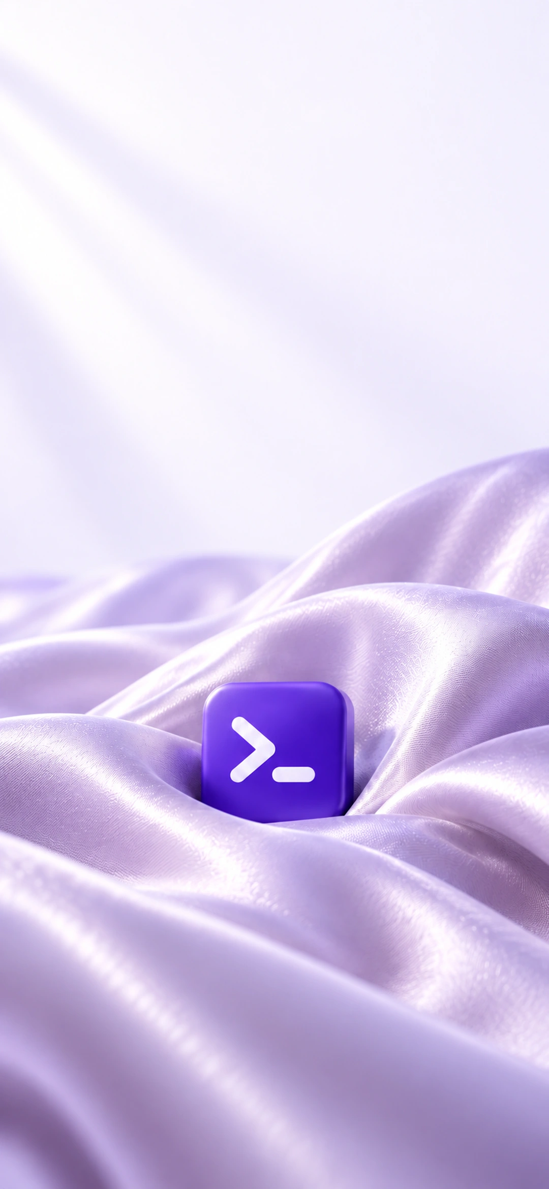 A purple terminal prompt tile resting among flowing violet satin folds, light phone composition